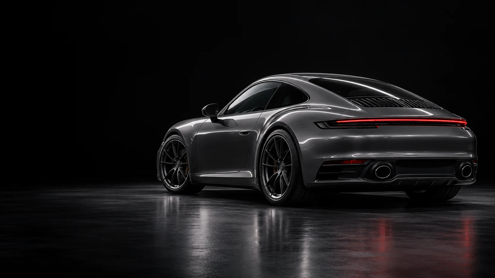 Graphite performance coupe under white studio lighting